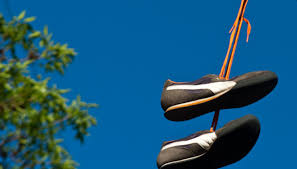 Unraveling the Truth: What Throwing Shoes on Power Lines Really Means